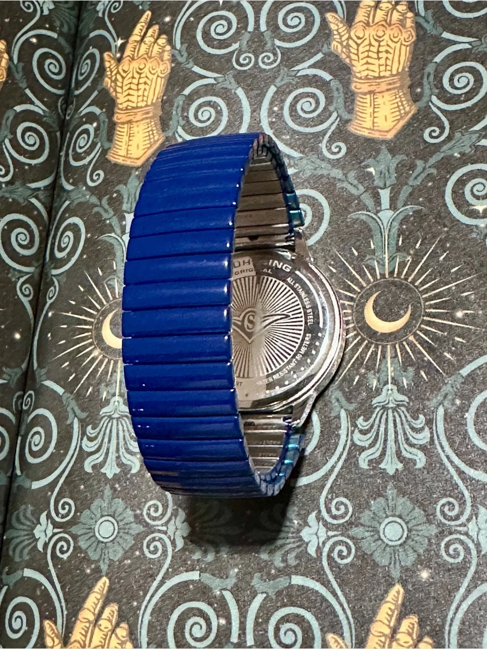 Stuhrling Original Sapphire Blue Crystal Bezel Mother of Pearl watch
